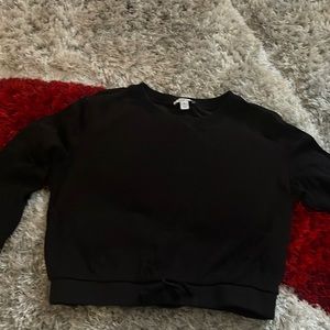 Black long sleeved top with elastic bottom